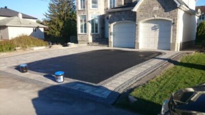 Freshly sealed asphalt driveway